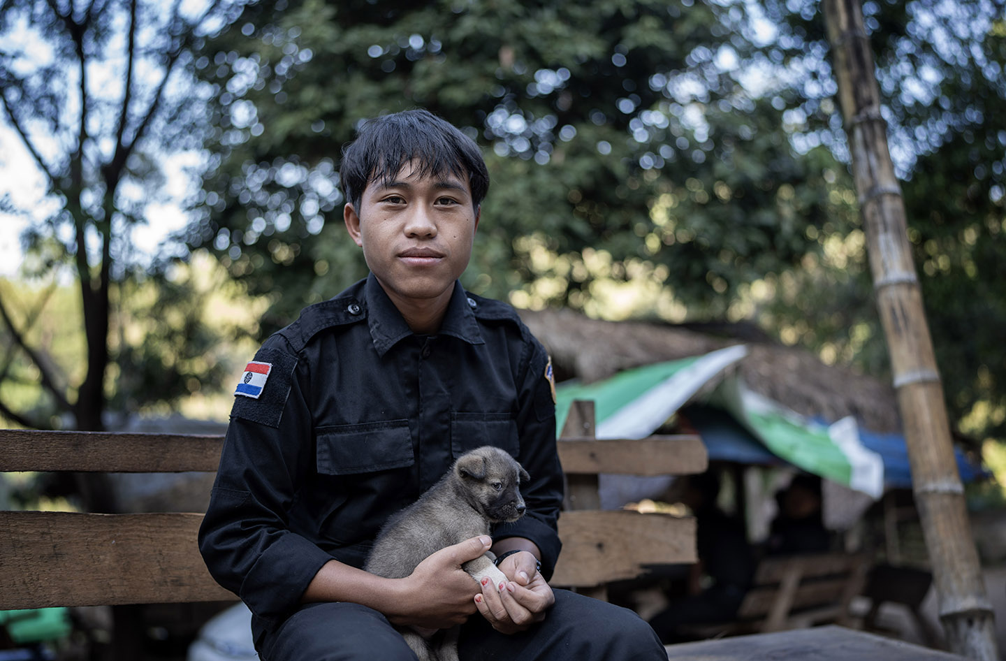 Officer holds a puppy