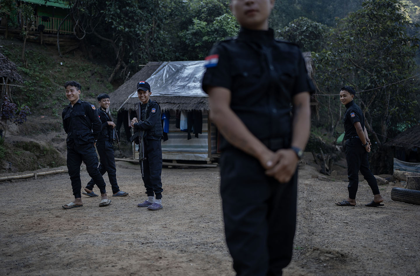 Officers stand in a group and smile