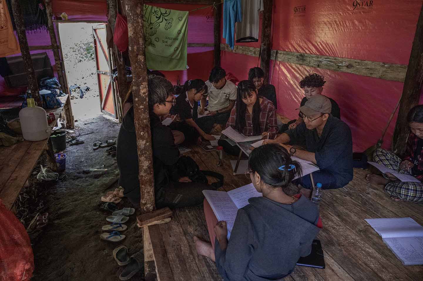 Doctors sit in a circle and read papers