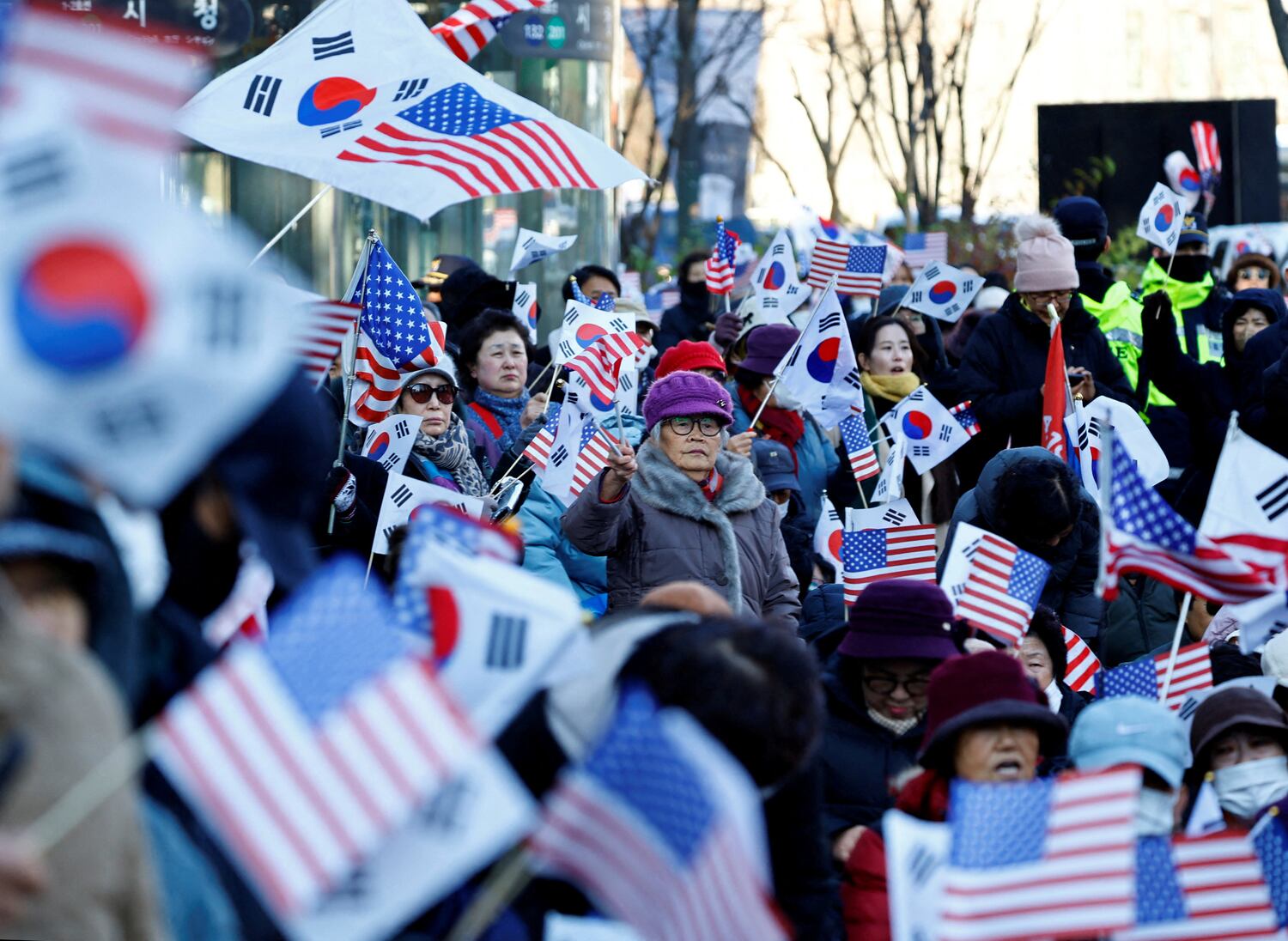 Protesters from conservative groups attend a rally supporting South Korean President Yoon Suk Yeol and denouncing opposition party's politicians after the President's surprise declaration of the martial law last night, which was reversed hours later in Seoul, South Korea, Dec. 4, 2024.