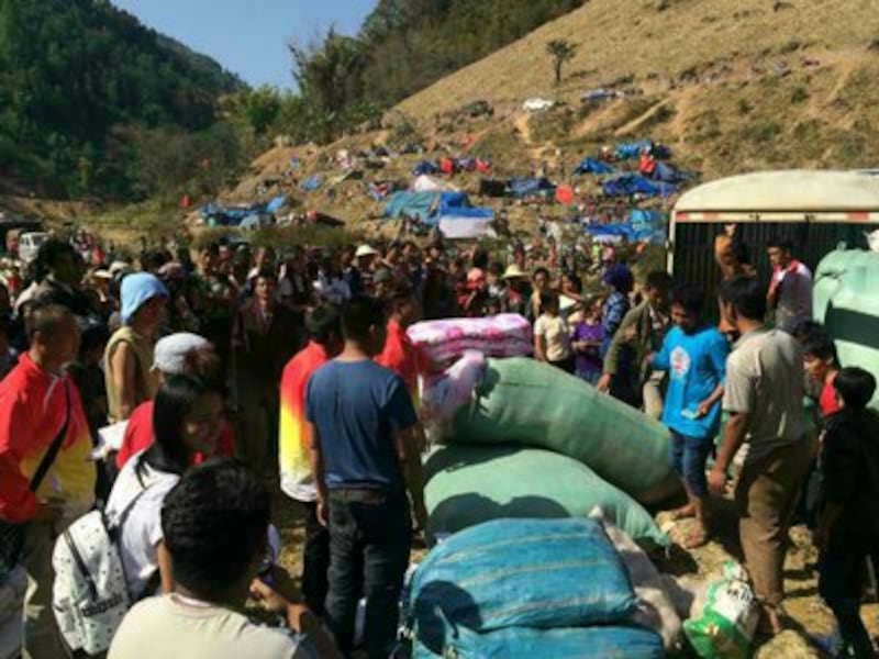 Refugees from the Kokang fighting gather at a refugee camp on the border between China and Myanmar, March 2, 2015. 