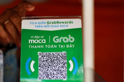 Dịch vụ ví điện tử e-wallet thanh toán bằng cách scan QR code của Grab.