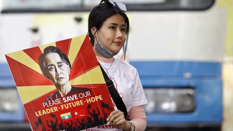 myanmar-protester-indonesia-embassy-yangon-feb23-2021.jpg