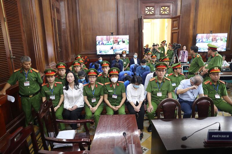 Truong My Lan, front row third from left, looks on in court in Ho Chi Minh City on April 11, 2024. (AFP)