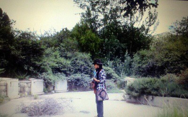 Tsering Woeser visits the Martyrs' Cemetery in Lhasa, July 2013. Photo courtesy of Invisible Tibet.