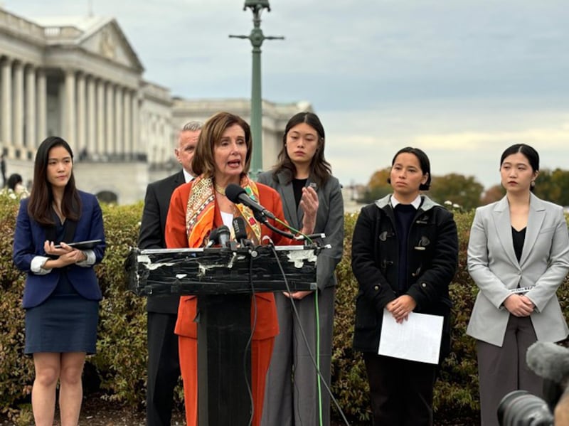 Frances Hui, Joey Siu and Anna Kwok with former House Speaker Nancy Pelosi at a rally in support of the 45 jailed Hong Kong democracy activists in Washington, Nov. 19, 2024.