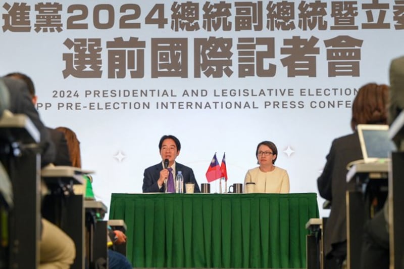 Taiwan's Vice President and presidential candidate of the ruling Democratic Progressive Party Lai Ching-te (L) and his running mate Hsiao Bi-khim hold a press conference in Taipei, Jan. 9, 2024. (Sam Yeh/AFP)