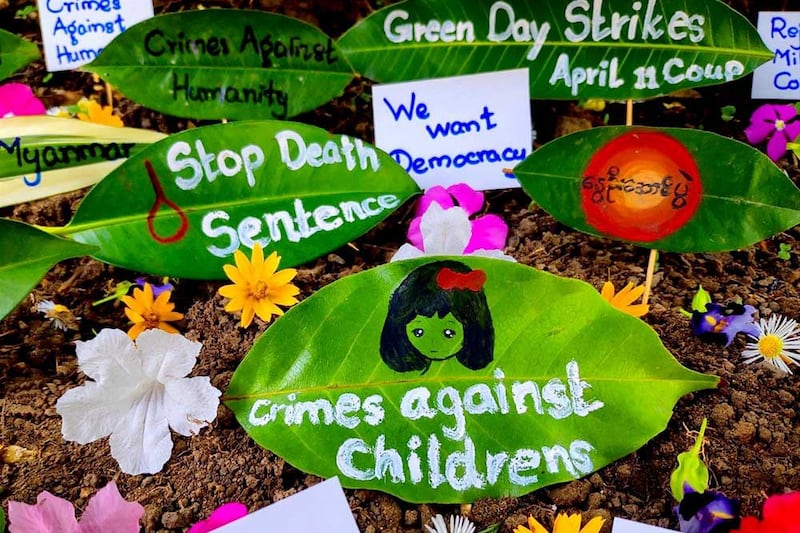 Slogans and photos decorate leaves as part of a “Green Day Strike” held this past week. (AFP/Anonymous source)