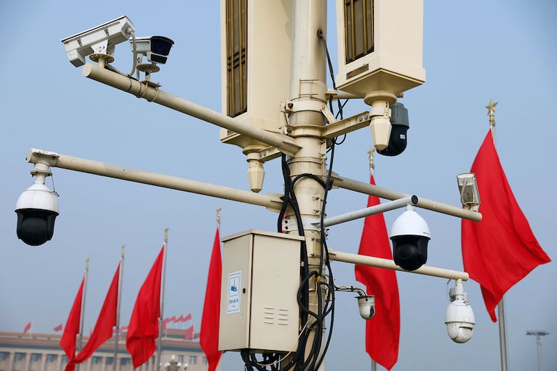 CCTV cameras overlook Tiananmen Square in Beijing, China September 30, 2022.