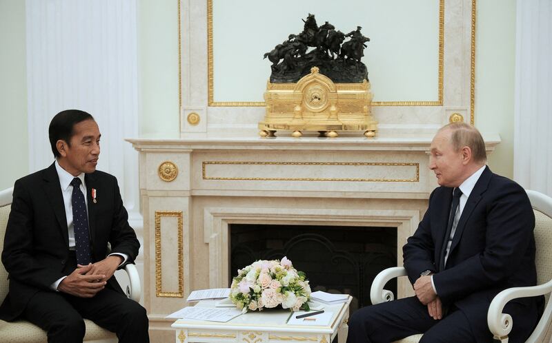 Russian President Vladimir Putin (right) meets with Indonesian President Joko Widodo at the Kremlin in Moscow, June 30, 2022. Credit: Sputnik/Kremlin via Reuters