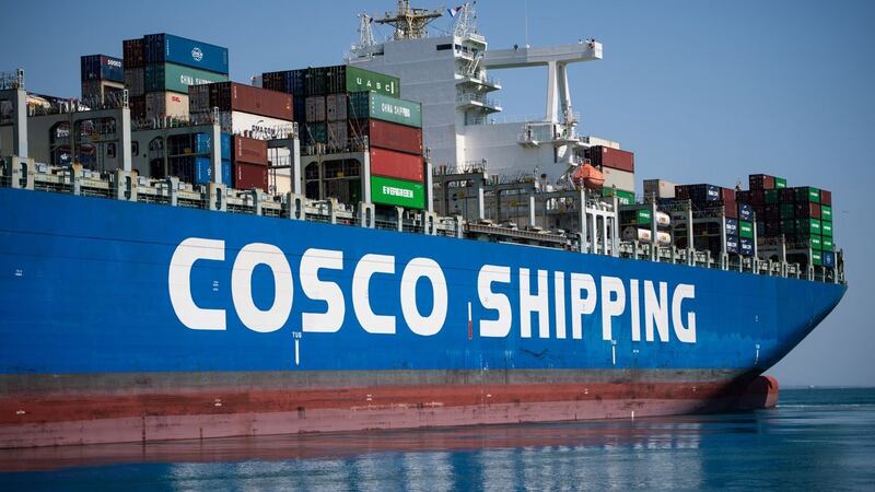 A COSCO Shipping cargo ship leaving the EuroFos terminal at the Fos-Sur-Mer harbor, in Marseille, southern France, July 23, 2020. COSCO formed out of a state-backed merger between two of China's biggest shipping conglomerates in 2016, creating the third-largest shipping company in the world.