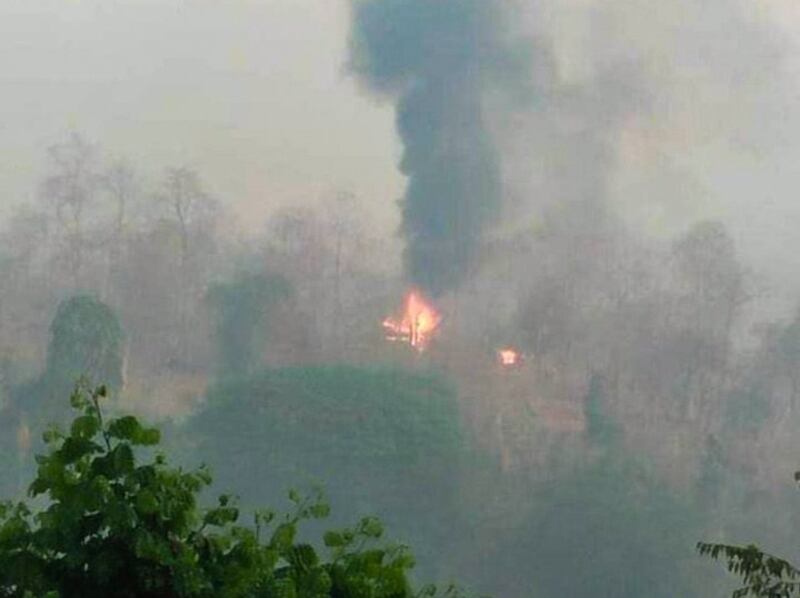 Smoke and fire are seen at the Myanmar army's Mel Kha Hta camp along the Thanlwin River on the Myanmar-Thailand border, Tuesday, March 28, 2023. Credit: Mekong News