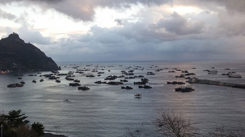 Chinese squid fishing boats take shelter in a harbor in South Korea's Ulleung County, in undated photo,