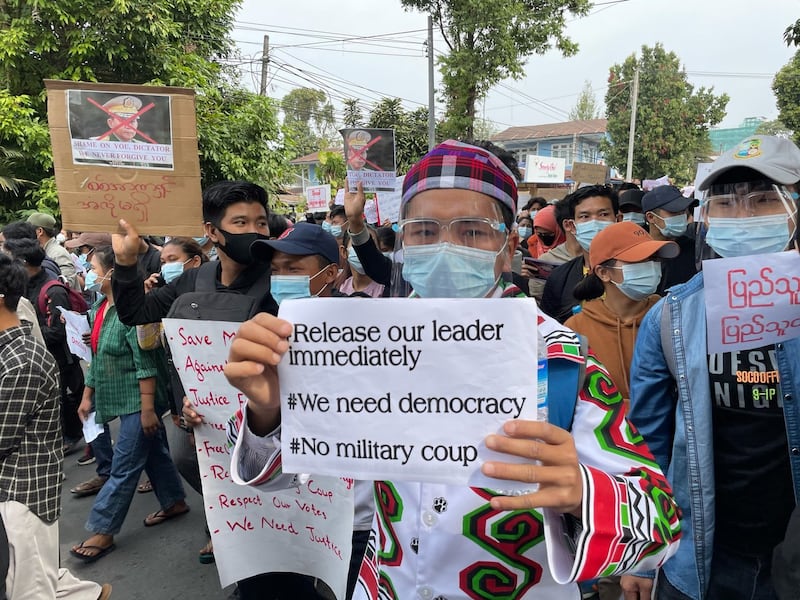 Protesters join in a demonstration against the military coup in the Kachin state capital Myitkyina, Feb. 8, 2021.