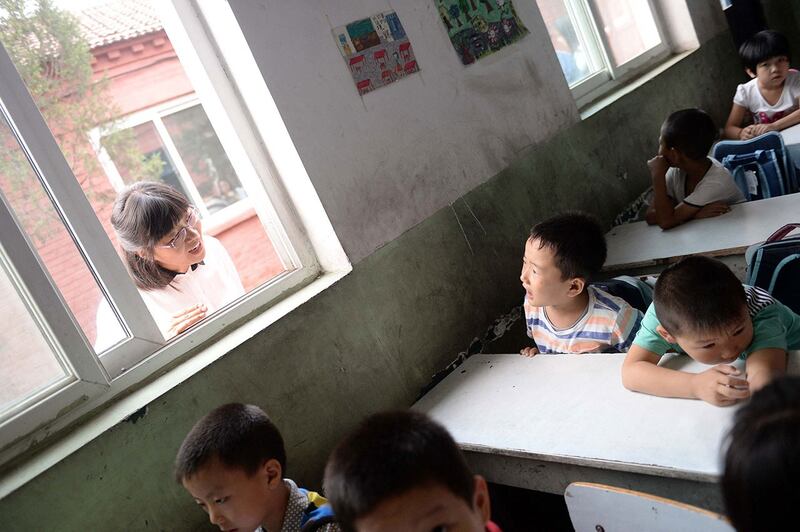 资料图片：北京一所民办农民工子弟私立学校。（法新社）