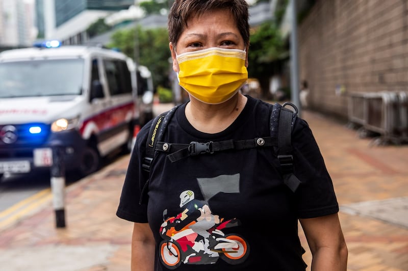 A supporter of Tong Ying-kit wears a t-shirt showing an illustration of Tong's act outside the High Court in Hong Kong, following Tong's conviction in the first trial conducted under a national security law imposed by China, July 27, 2021. Credit: AFP