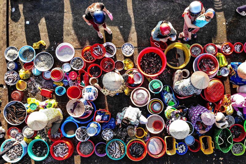 Vendors sell fish at Vi Thanh market in Hau Giang province, Vietnam in 2023. Vietnam realized 8.5% growth in 2022 and had commitments of $22.4 billion of foreign direct investment pledged for 2023.