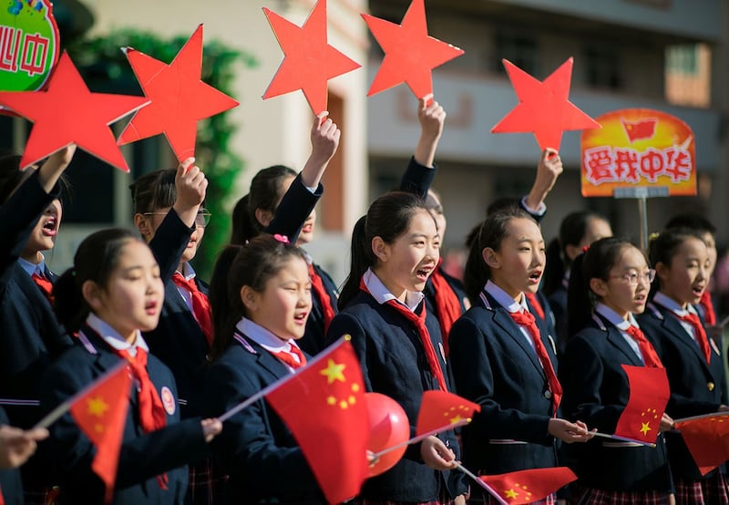 资料图片：蒙古自治区呼和浩特举行的小学新学期开学典礼（路透社）