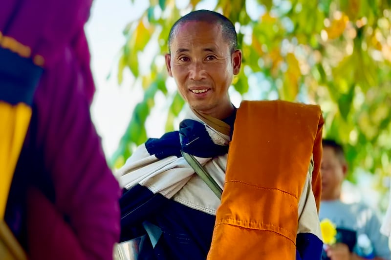 Vietnamese monk Thich Minh Tue walks in Chong Mek, Ubon Ratchathani Province, Thailand, Dec. 31, 2024, as he arrives in Thailand from Laos.