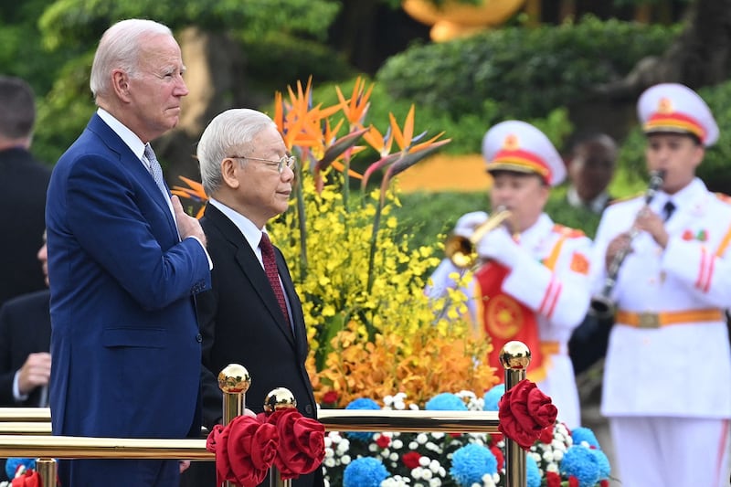 President Joe Biden attends a welcoming ceremony hosted by Vietnam's Communist Party General Secretary Nguyen Phu Trong, next to Biden, in Hanoi on Sept. 10, 2023. (Saul Loeb/AFP)