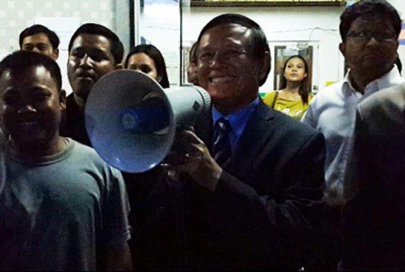 Kem Sokha speaks to supporters at the Cambodia National Rescue Party's headquarters in Phnom Penh on June 7, 2013. Photo credit: RFA.