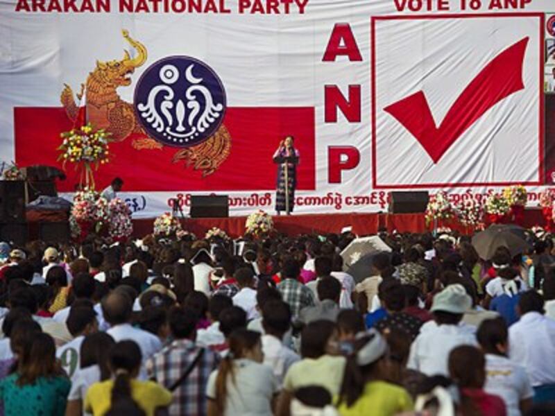 Ethnic Rakhine people attend a campaign rally for the Arakan National Party in Yangon, Oct. 25, 2015.