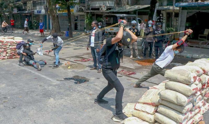 Giant slingshots have been built by protesters around Yangon. Associated Press photo