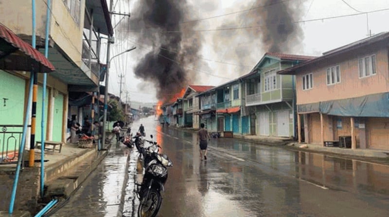 Homes in Thantlang in western Myanmar's Chin state burn after being hit by artillery fire by Myanmar junta forces amid clashes with local joint militia groups, Sept. 18, 2021. Credit: Citizen journalist