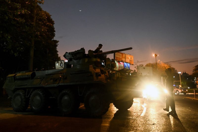 A tank vehicle is deployed on a city street, following days of mass protests against the military coup, in Yangon, Feb. 14, 2021. Credit: AFP