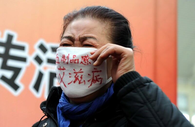 资料图片：河南艾滋病感染者在北京请愿，呼吁当局关注。（AFP）