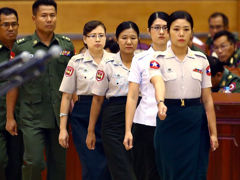 New female military recruits prepare to take their oaths before the lower house of parliament in Naypyidaw, May 17, 2018.