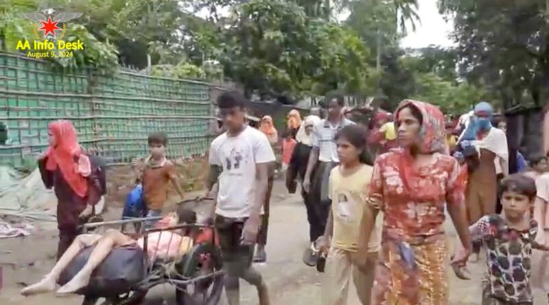 A screenshot from a video documents the Arakan Army rescuing Muslim elders, women, men and children from the Bo Hsu Village of Maungdaw Township, Aug. 8, 2024. (AA Info Desk via Telegram)