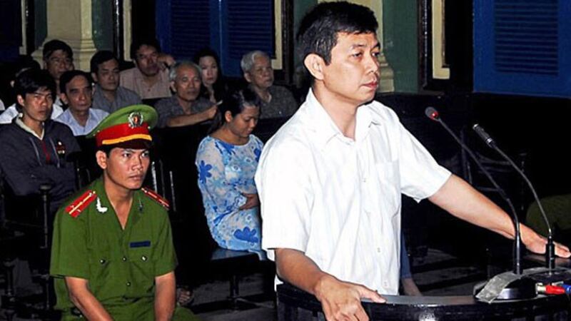 Tran Huynh Duy Thuc is shown at his trial in Vietnam's Ho Chi Minh City, Jan. 20, 2010.