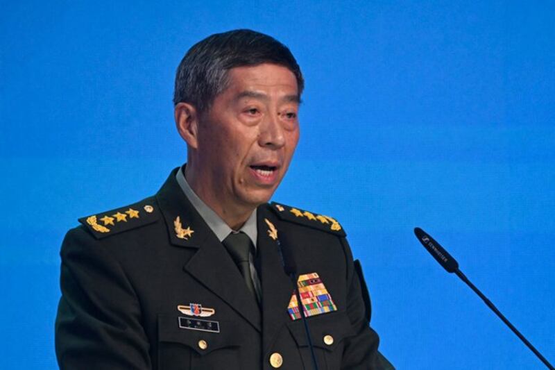 China's Defense Minister Li Shangfu, shown at a conference in August 2023, was removed from office in October. (Alexander Nemenov/AFP)