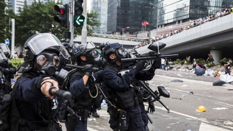 Police fire tear gas at protesters in Hong Kong's Admiralty District, June 12, 2019.