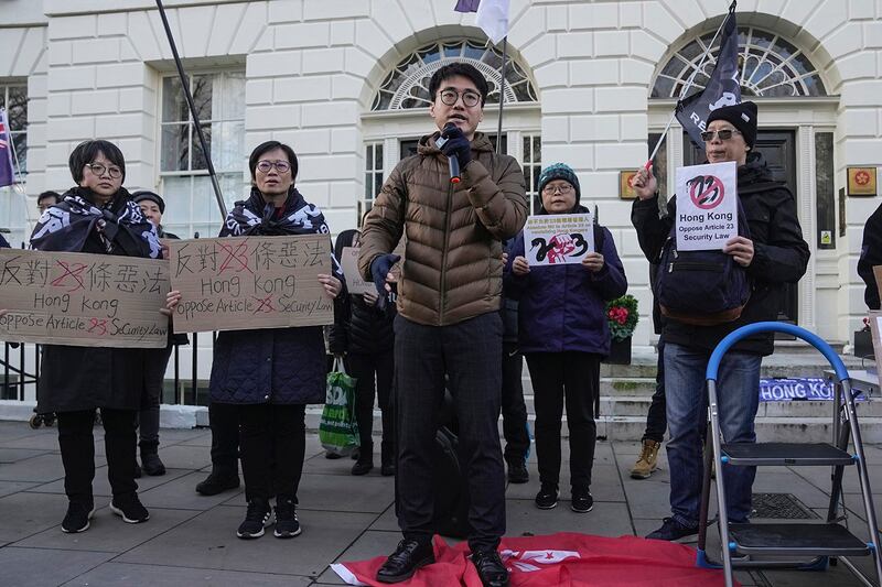 Hong Kong activist Simon Cheng speaks at a protest against Hong Kong's new national security law, Article 23, in London, March 23, 2024. (Kin Cheung/AP)