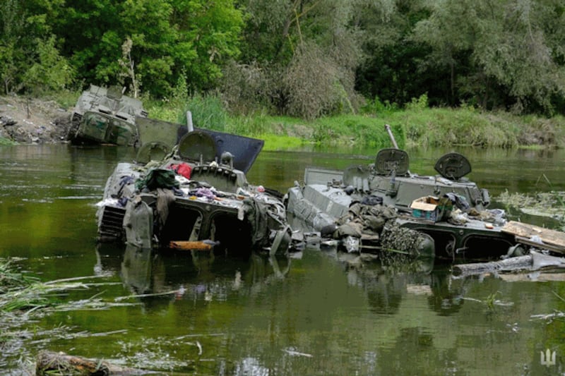 Armored fighting vehicles abandoned by Russian soldiers are seen during a counteroffensive operation of the Ukrainian Armed Forces amid Russia's attack on Ukraine in Kharkiv region, Ukraine, in this handout picture released Sept. 11, 2022. Credit: Press service of the Commander-in-Chief of the Armed Forces of Ukraine via Reuters