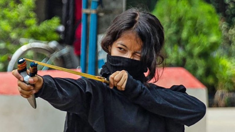 myanmar-protester-slingshot-thaketa-twp-yangon-mar30-2021.jpg