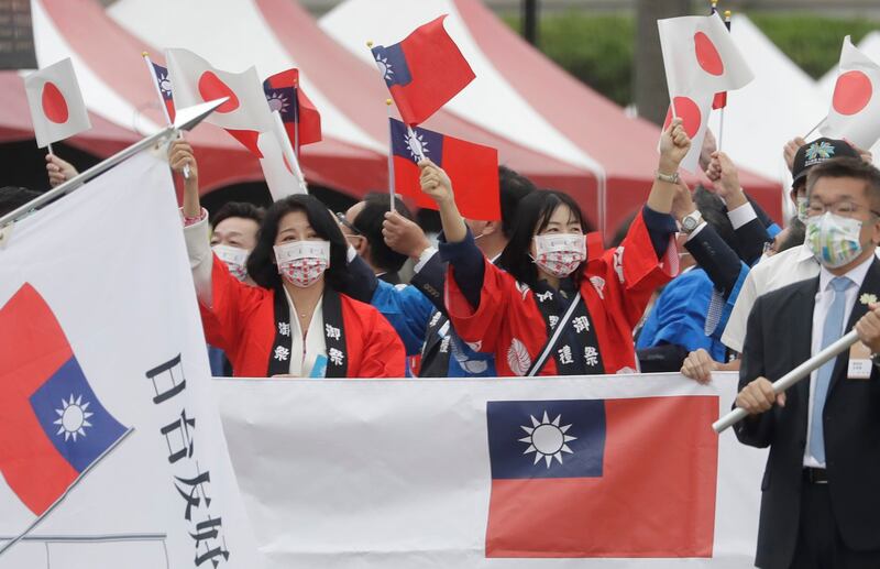 Japanese lawmakers attend National Day celebrations in front of the Presidential Building in Taipei, Taiwan, Oct. 10, 2022. Credit: AP