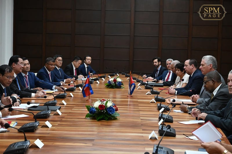 6 Chen Zhi at rice meeting with Cuban President.jpg