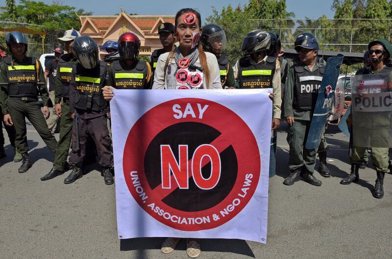 A Cambodian protest against a controversial law regulating non-governmental organizations in Phnom Penh, July 24, 2015. (Tang Chhin Sothy/AFP)