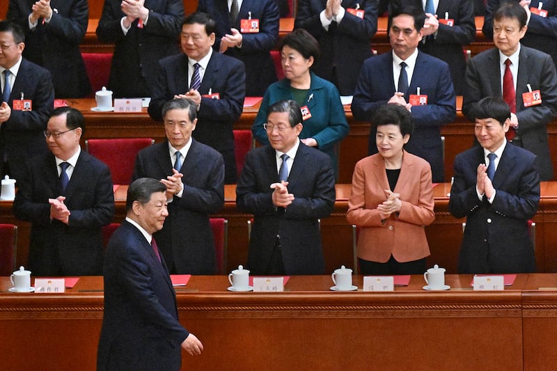 China’s president Xi Jinping arrives for the closing session of the National People’s Congress in Beijing, March 11, 2025.