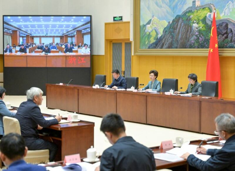 Chinese State Councillor Shen Yiqin speaks at a national teleconference on clearing wage arrears for migrant workers, in Beijing, Nov. 30, 2023. (Gao Jie/Xinhua via Getty Images)