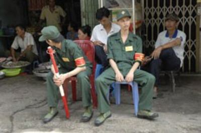 Lực lượng dân phòng ở TPHCM. AFP photo 