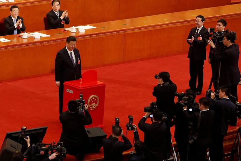 2018 年 3 月 11 日，习近平在十三届全国人大一次会议上，通过宪法修正案草案，取消国家主席任期限。（路透社）