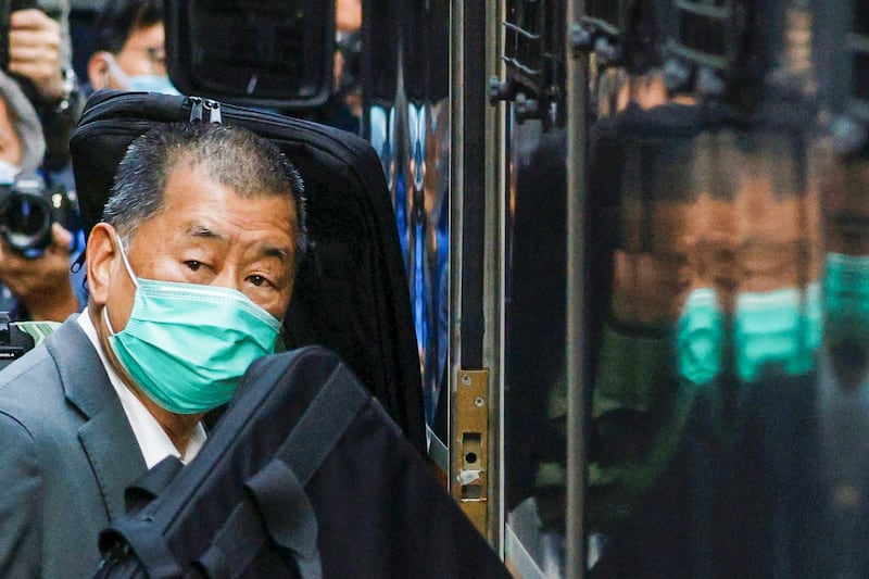 Media tycoon Jimmy Lai, founder of Apple Daily, looks on as he leaves the Court of Final Appeal by prison van, in Hong Kong, China February 1, 2021. (Tyrone Siu/Reuters)