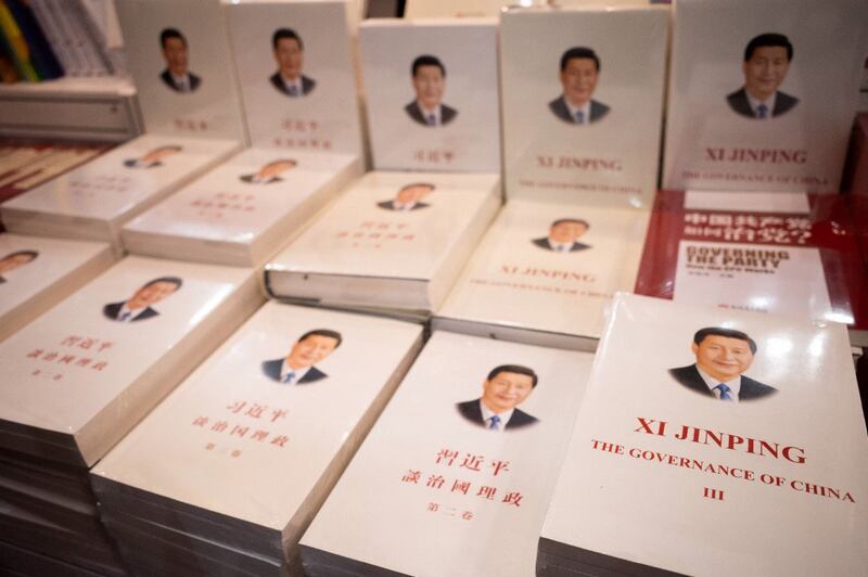 Books by Chinese President Xi Jinping are set out on display at a booth at the annual Hong Kong Book Fair in Hong Kong, July 17, 2021. Credit: AFP