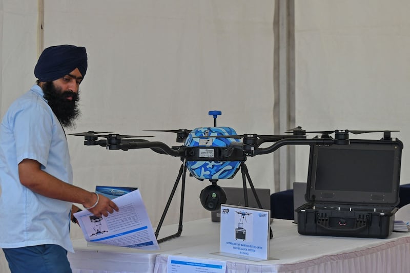 A Hexacopter drone used in unmanned aerial surveillance manufactured by Bharat Electronics is displayed during a defense exhibition in Bangalore, Dec. 2021. Indian arms manufacturer Bharat Electronics Limited transferred military equipment worth more than US$5.1 million to Myanmar's army over a period of six months from November 2022 to April 2023, the rights group Justice for Myanmar reported in June. Credit: Manjunath Kiran/AFP