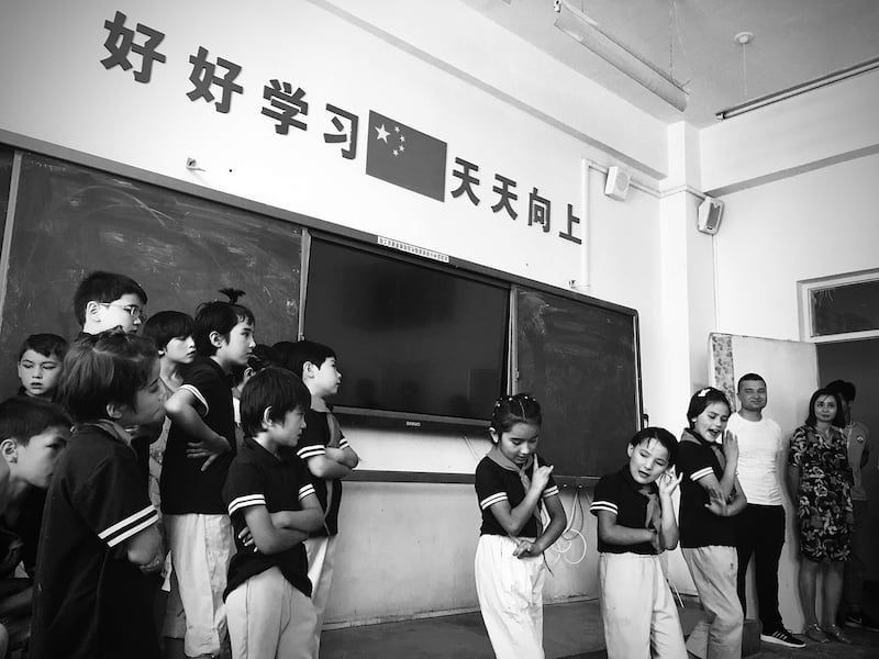 Students at the Paxiang Central Primary School perform during a 2019 trip to Xinjiang by a Taiwanese delegation that included high-school students.