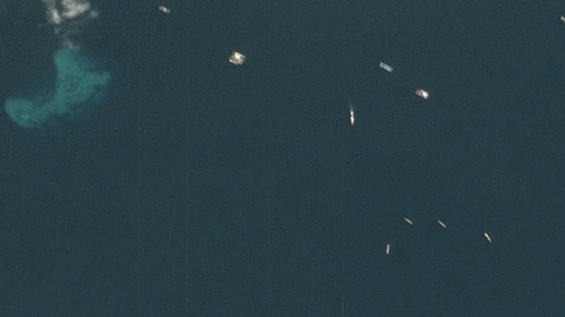 Satellite imagery over Union Banks in the Spratly Islands, where Chinese fishing vessels are sailing south in an area not covered by China's annual summer fishing ban. Holiday Reef can be seen in the upper left of the picture, taken May 10, 2020.